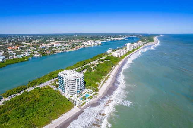 drone / aerial view with a view of the beach and a water view