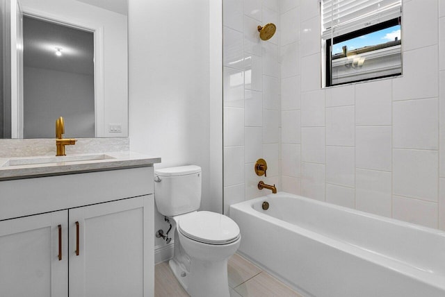 13450 Artisan Cir, Palm Beach Gardens, FL 33418 - bathroom featuring toilet, vanity, and bathing tub / shower combination