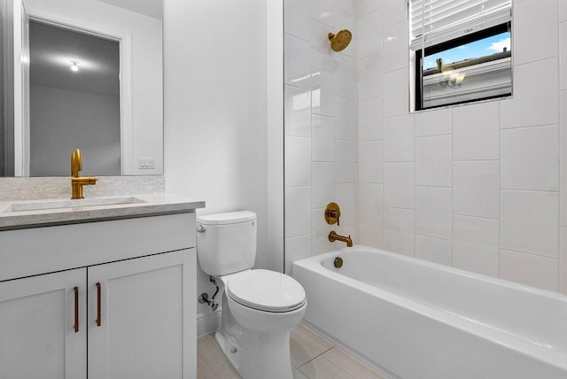 full bathroom with shower / bathing tub combination, vanity, and toilet