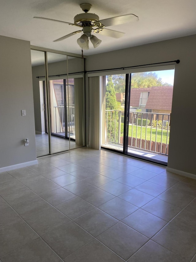 unfurnished room with ceiling fan