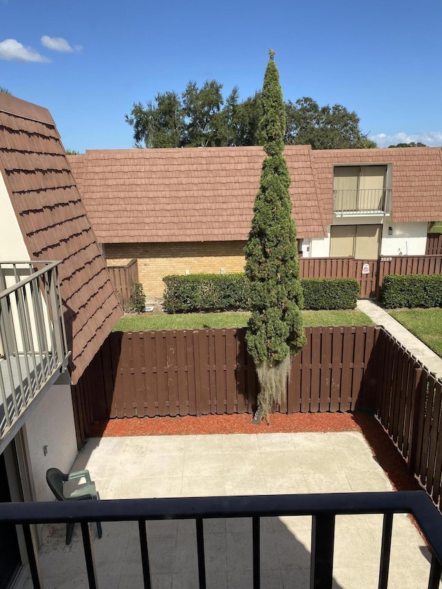 view of patio with a balcony