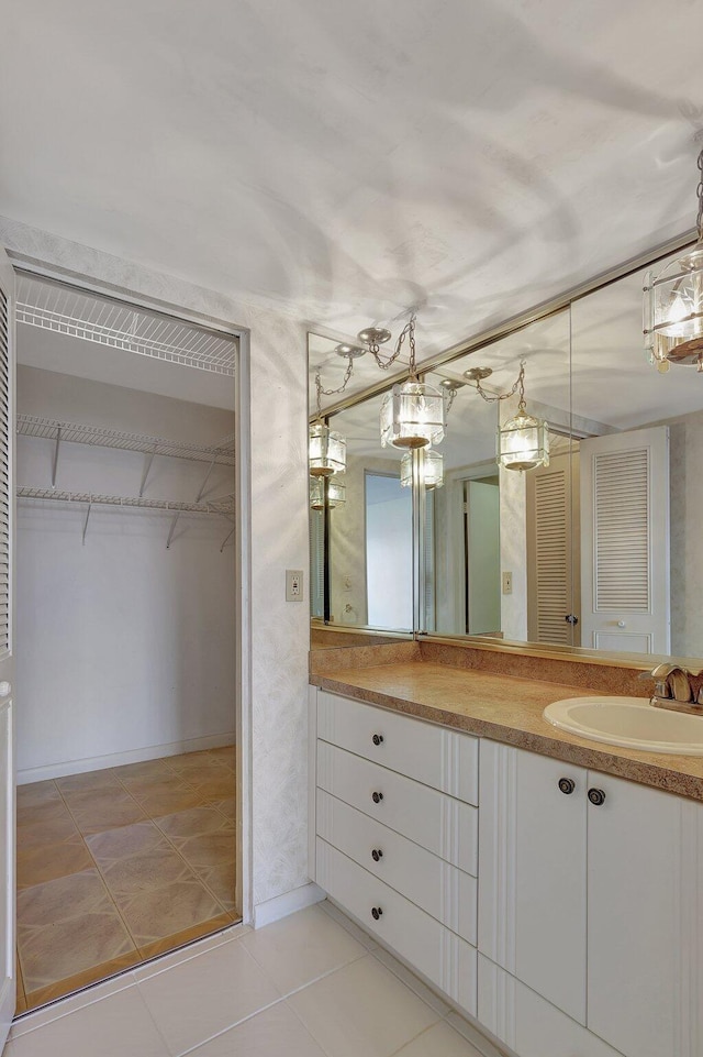 bathroom with vanity and tile patterned floors