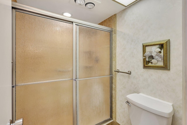 60 Yacht Club Dr Unit 106, North Palm Beach, FL 33408 - full bathroom featuring toilet, an enclosed shower, and wallpapered walls