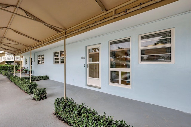 entrance to property with a patio area