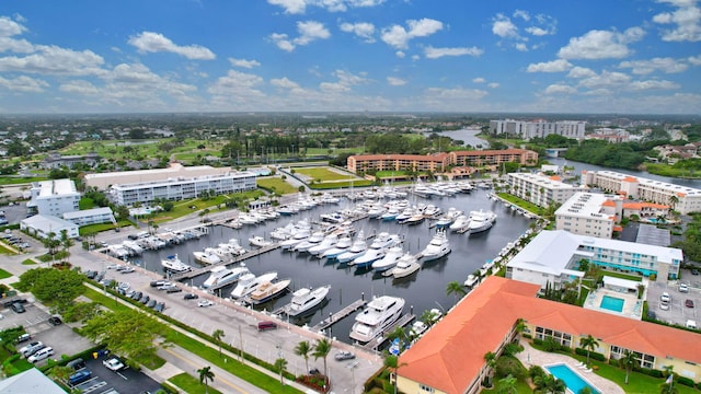 60 Yacht Club Dr Unit 106, North Palm Beach, FL 33408 - view of urban area with a marina, a nearby body of water, and a pool