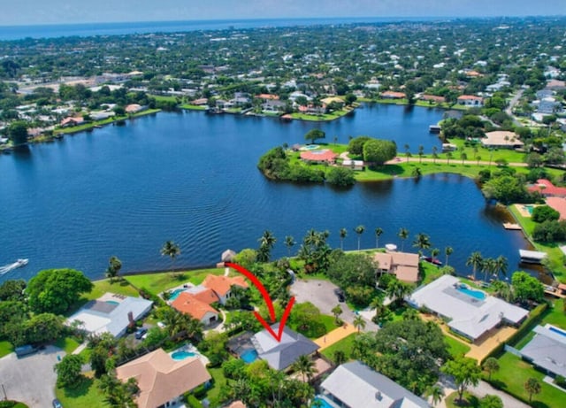 bird's eye view with a water view