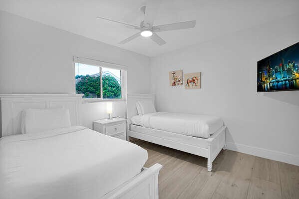 bedroom featuring ceiling fan and light hardwood / wood-style floors