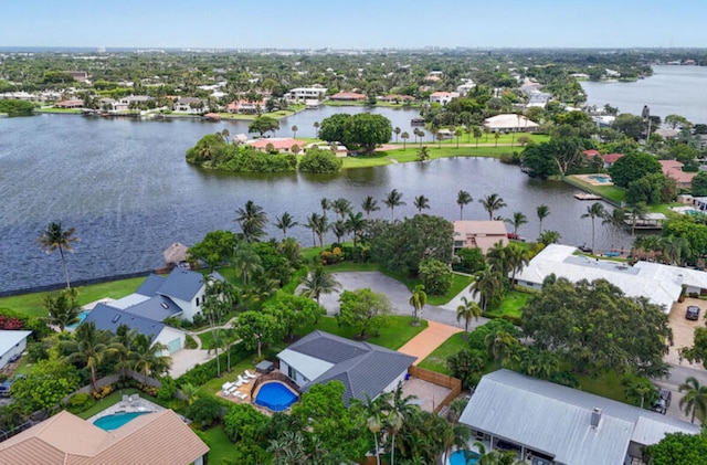 bird's eye view with a water view