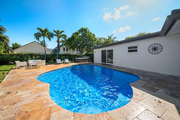 view of swimming pool with a patio