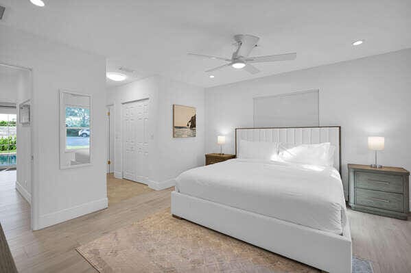 bedroom with ceiling fan, a closet, and light wood-type flooring