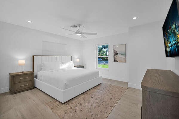 bedroom with ceiling fan and light wood-type flooring