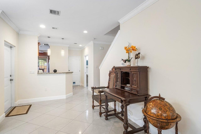 interior space with ornamental molding and light tile patterned floors