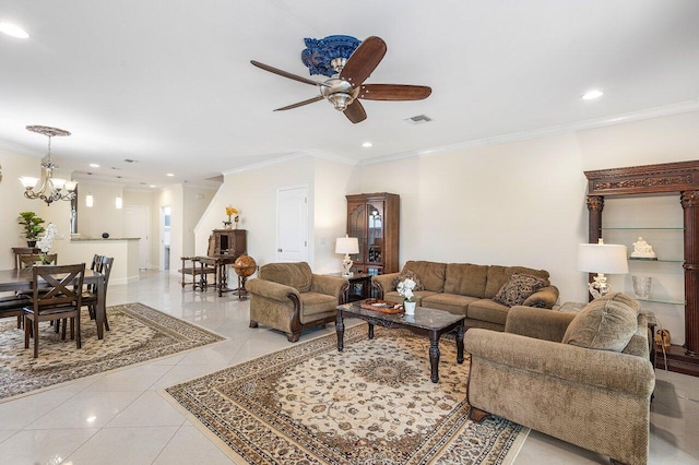 tiled living room with ceiling fan with notable chandelier and crown molding