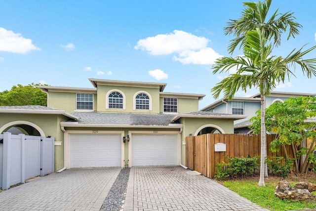 view of front of property with a garage