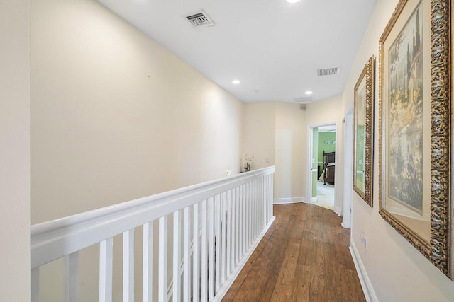 hallway featuring dark hardwood / wood-style flooring