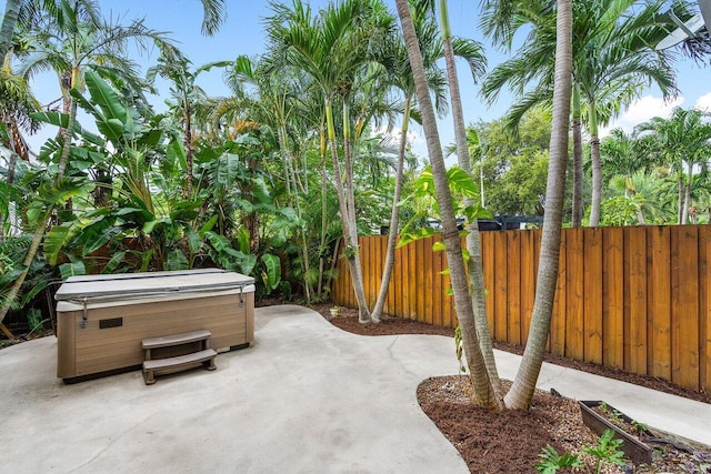 view of patio with a hot tub