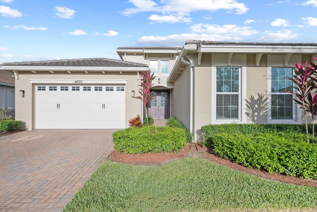 view of front of home featuring a garage