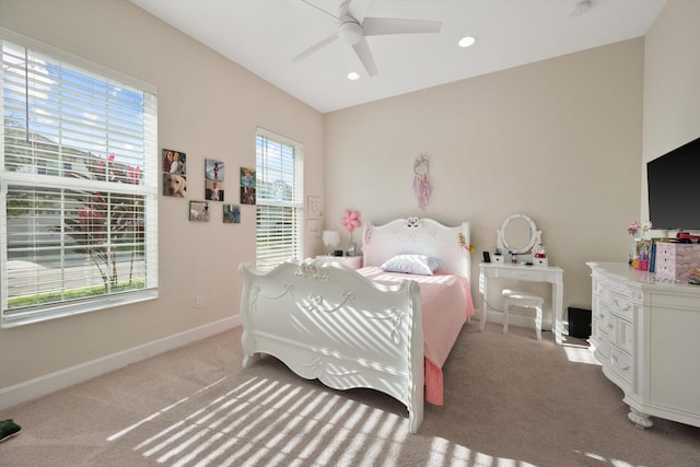 carpeted bedroom with ceiling fan