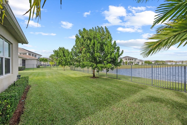 view of yard with a water view