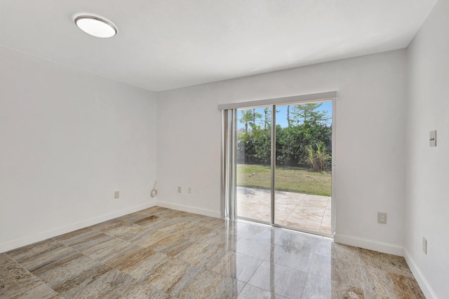 16412 62nd Rd N, The Acreage, FL 33470 - empty room with baseboards