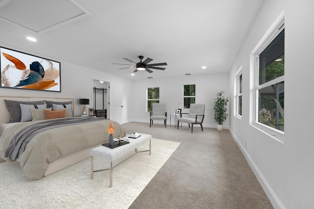 carpeted bedroom featuring ceiling fan