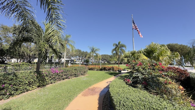 view of home's community with a lawn