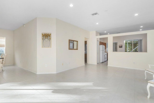 interior space with light tile patterned floors