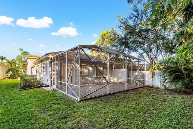 view of outbuilding with a yard