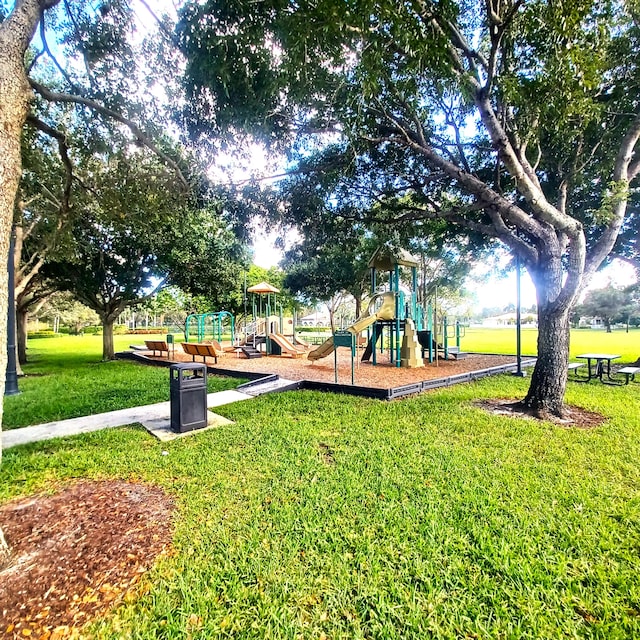 view of playground with a yard