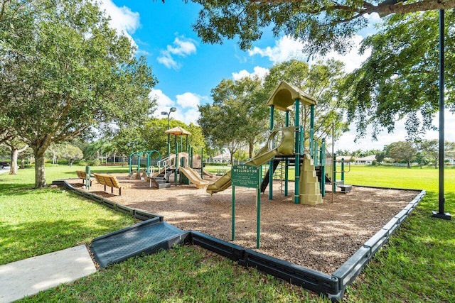 view of playground with a yard