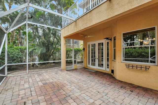 unfurnished sunroom with french doors