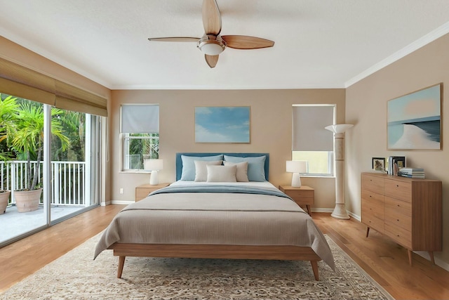 bedroom featuring light wood-type flooring, access to outside, ceiling fan, and ornamental molding