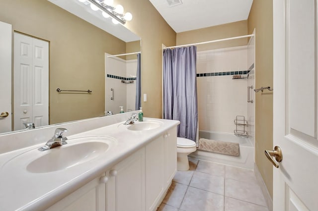 full bathroom with shower / bath combo with shower curtain, tile patterned flooring, vanity, and toilet