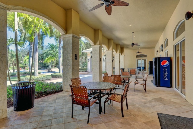 view of patio / terrace featuring ceiling fan