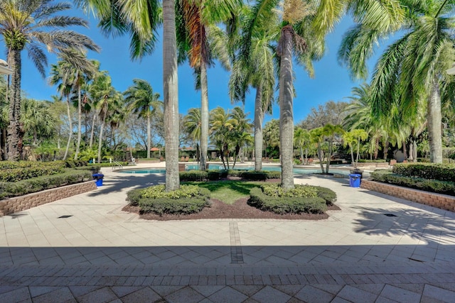 surrounding community featuring a swimming pool