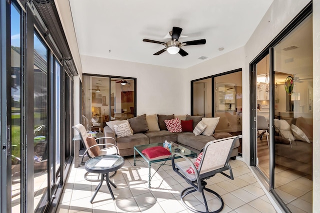 sunroom with ceiling fan