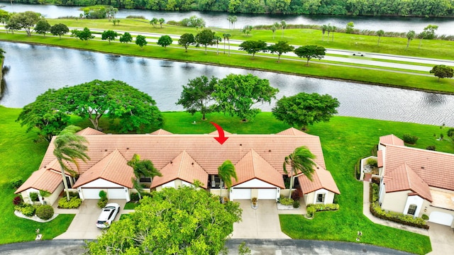 drone / aerial view featuring a water view