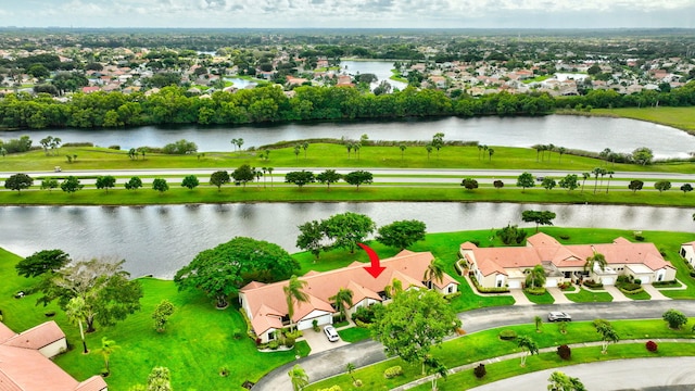 birds eye view of property featuring a water view