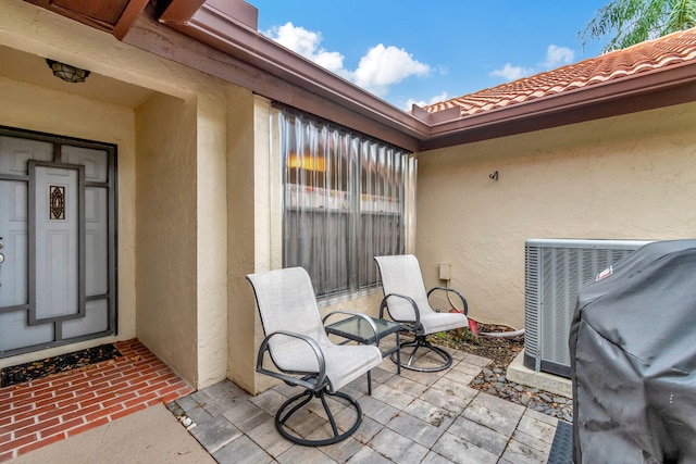 view of patio with central AC unit