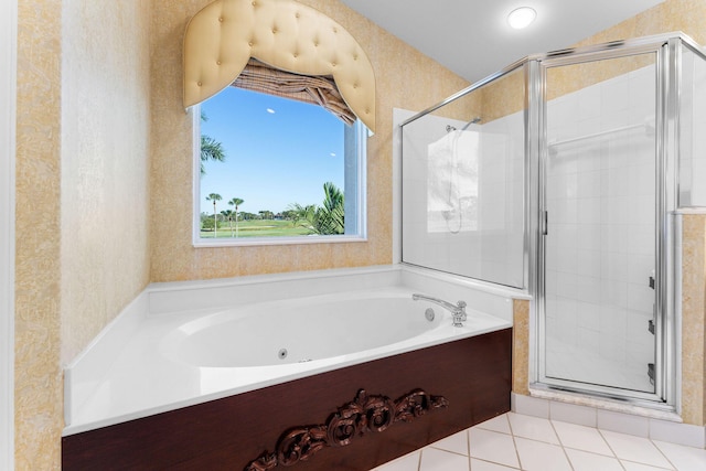 bathroom featuring tile patterned flooring and independent shower and bath