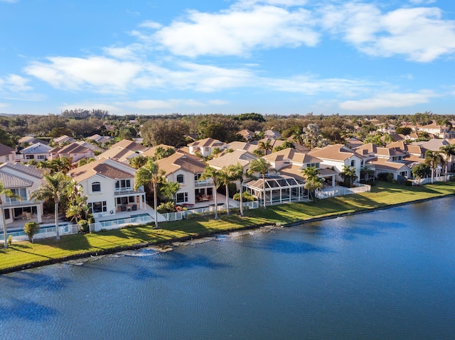 drone / aerial view with a water view