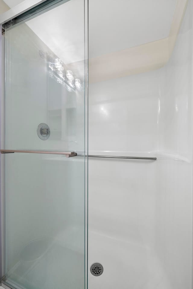 bathroom featuring walk in shower