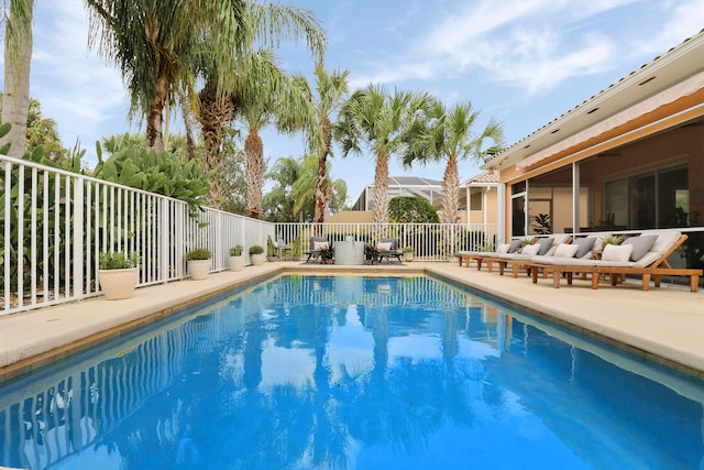 view of pool featuring a patio