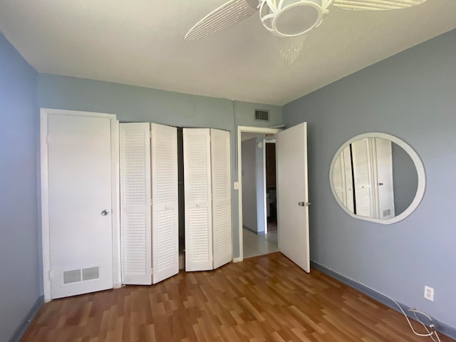 unfurnished bedroom featuring wood-type flooring