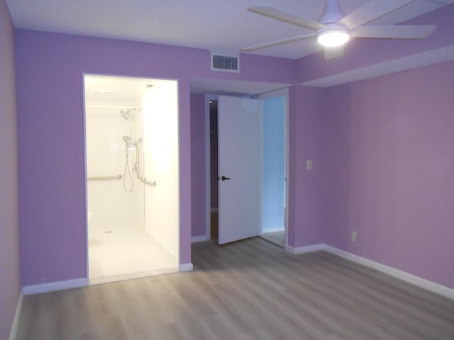 unfurnished bedroom featuring light hardwood / wood-style flooring and ceiling fan