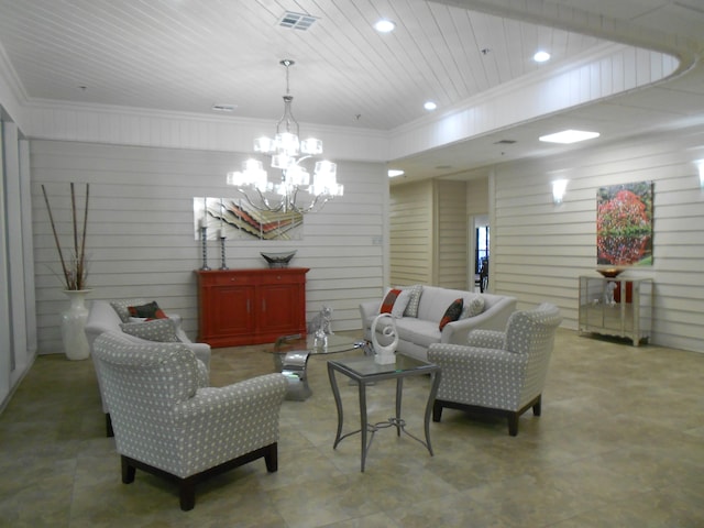 living room featuring a chandelier, wooden walls, and wood ceiling