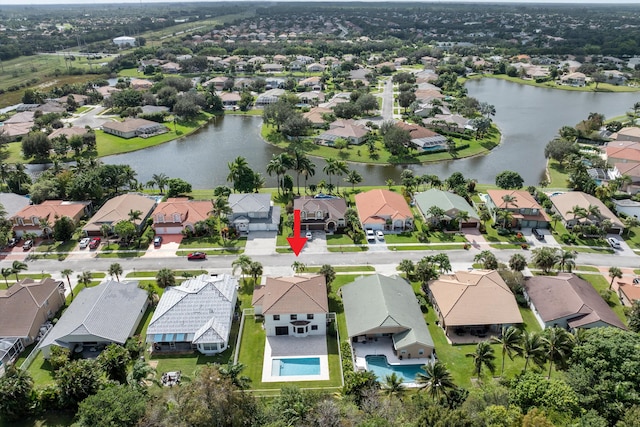 drone / aerial view with a water view