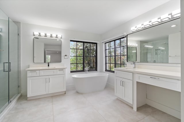 bathroom with independent shower and bath, vanity, and tile patterned floors