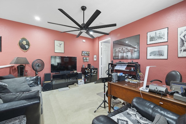 office space with carpet floors and ceiling fan