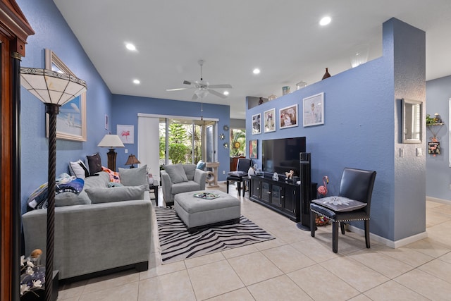 living room with light tile patterned flooring and ceiling fan